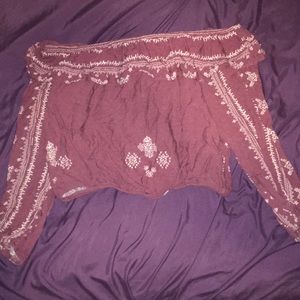 Cropped long sleeve shoulder-less top